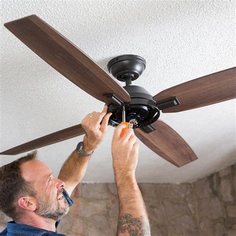 hanging ceiling fan between joists